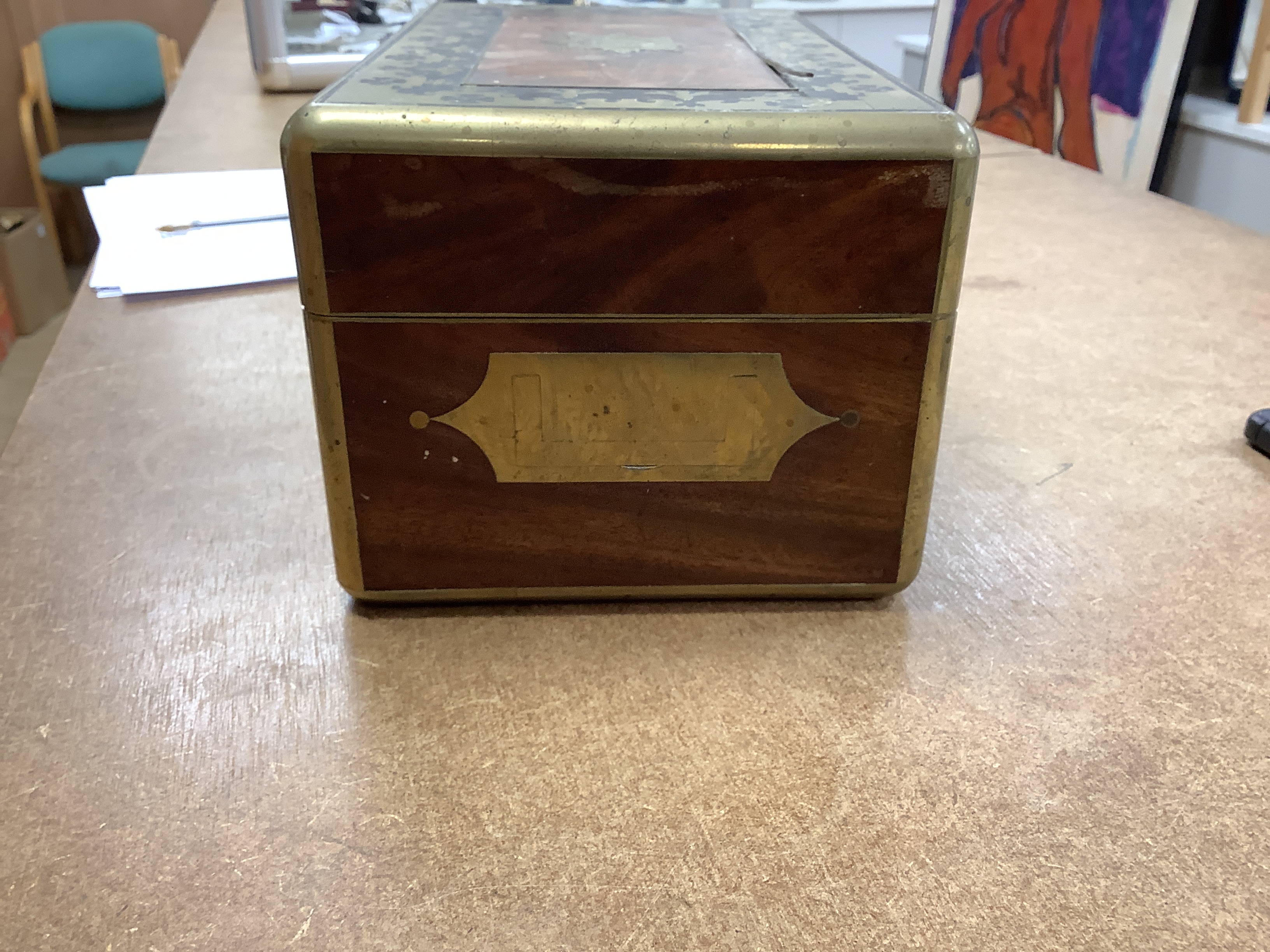 A William IV Cut brass, mahogany and ebony travelling vanity box, with silver-capped bottles, 24.5cm wide